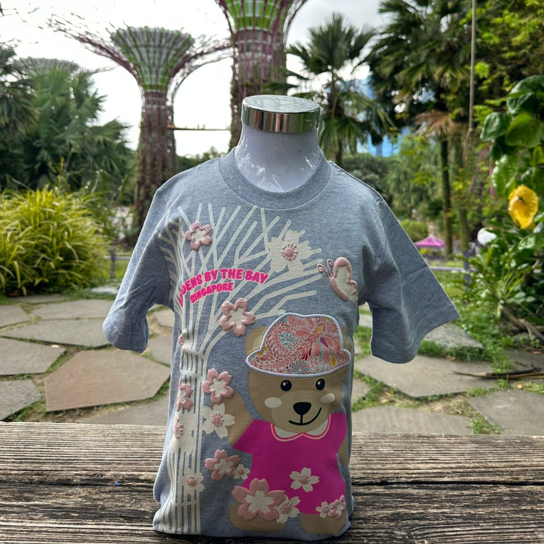 Gardens by the Bay - Gardens by the Bay Bear Collection - PLAYFUL PRISCA SUPERTREE AND SAKURA WITH BRAND PATTERN PATCHWORK KID’S T-SHIRT (LIGHT BLUE)